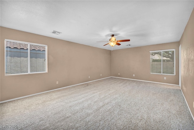8557 Hidden Pines Ave, Las Vegas, NV 89143 - spare room featuring ceiling fan and carpet floors