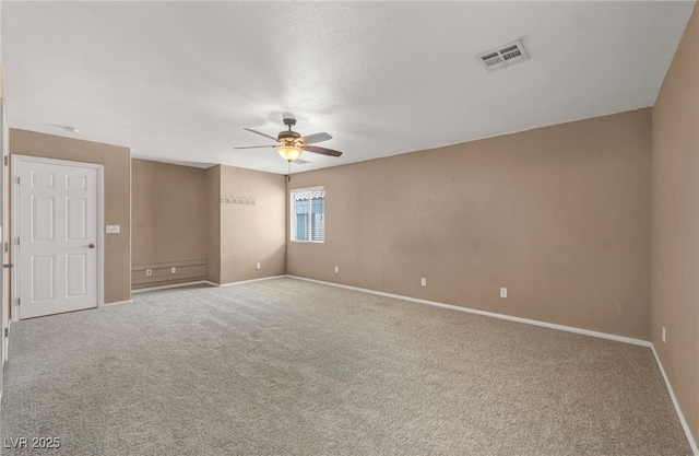 8557 Hidden Pines Ave, Las Vegas, NV 89143 - carpeted spare room with a ceiling fan and baseboards