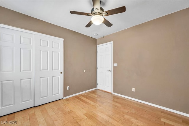 8557 Hidden Pines Ave, Las Vegas, NV 89143 - unfurnished bedroom with light wood-style floors, a closet, and a ceiling fan