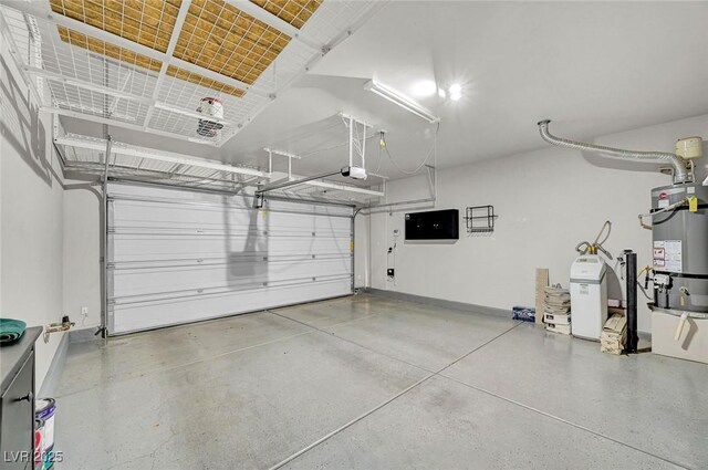 6373 Beavertail Pond Ave, Las Vegas, NV 89122 - garage featuring water heater and a garage door opener