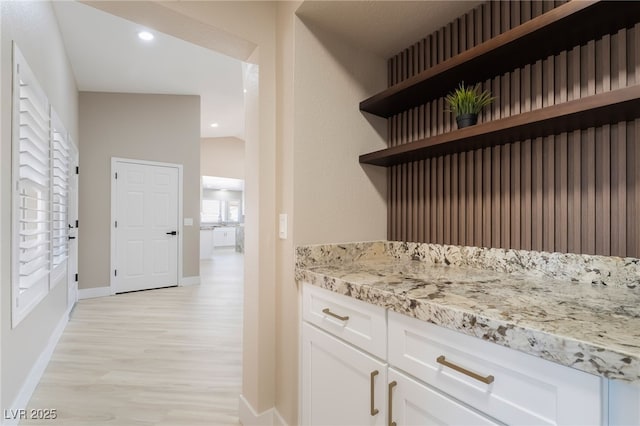 8904 Marble Dr, Las Vegas, NV 89134 - bar with light wood-type flooring and recessed lighting