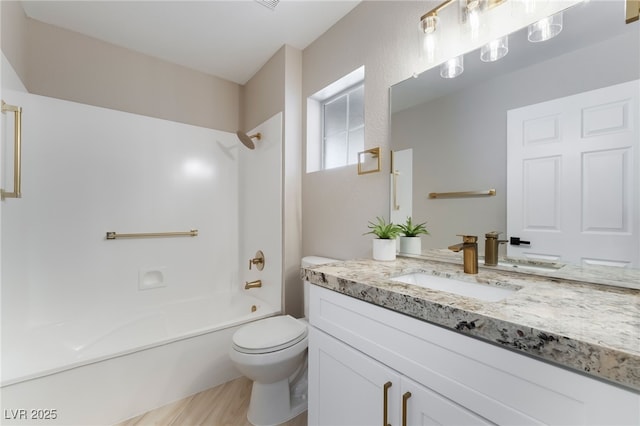 8904 Marble Dr, Las Vegas, NV 89134 - full bath with vanity, tub / shower combination, and wood finished floors