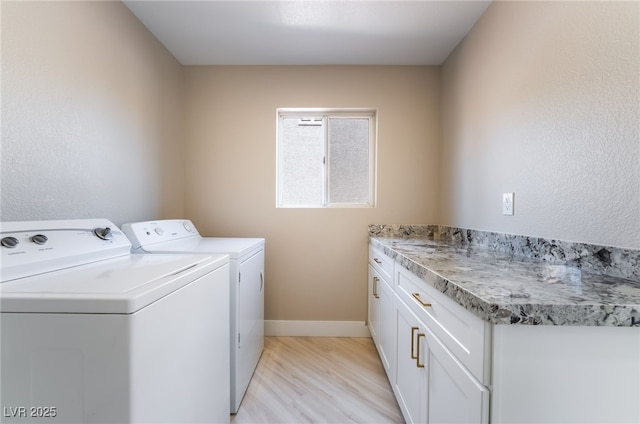 8904 Marble Dr, Las Vegas, NV 89134 - laundry room featuring washer and clothes dryer and cabinet space