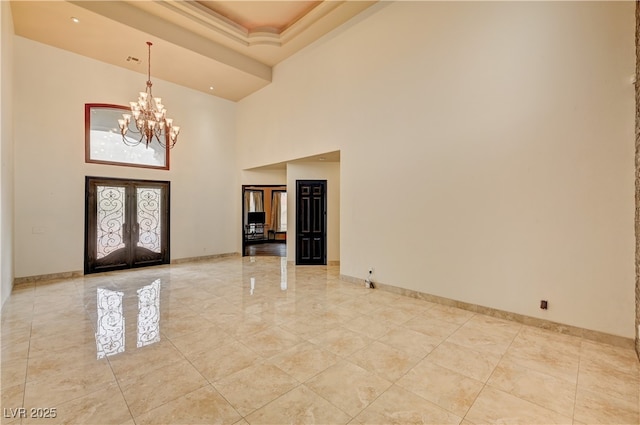 7751 Radcliff St, Las Vegas, NV 89123 - entrance foyer with a chandelier, a high ceiling, french doors, and light tile patterned floors