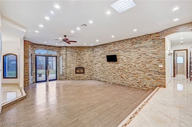 7751 Radcliff St, Las Vegas, NV 89123 - unfurnished living room with a ceiling fan, recessed lighting, healthy amount of natural light, and light wood-type flooring