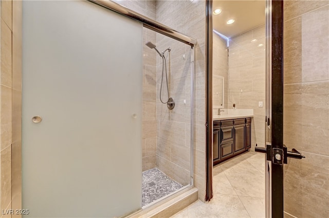 7751 Radcliff St, Las Vegas, NV 89123 - bathroom featuring a stall shower, vanity, and tile patterned flooring