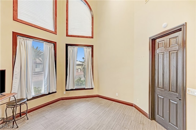 7751 Radcliff St, Las Vegas, NV 89123 - foyer with a high ceiling and baseboards