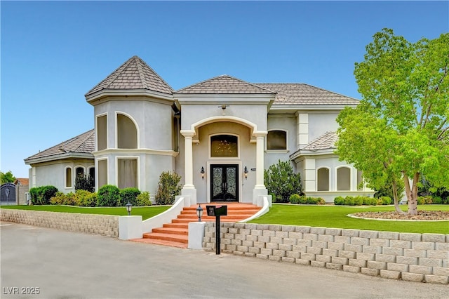 7751 Radcliff St, Las Vegas, NV 89123 - view of front facade featuring french doors, stucco siding, and a front yard