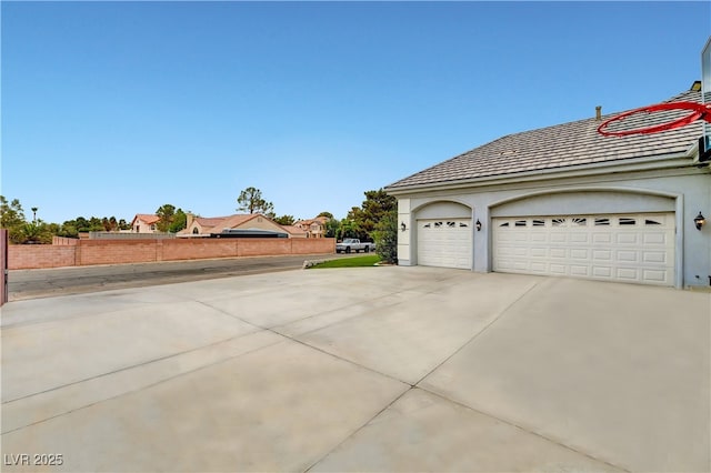 7751 Radcliff St, Las Vegas, NV 89123 - view of property exterior featuring stucco siding