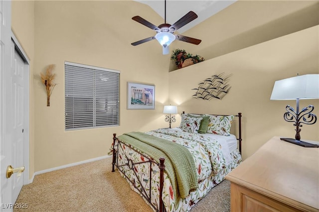 216 Chestnut Ridge Cir, Henderson, NV 89012 - bedroom featuring light colored carpet, a closet, a ceiling fan, and a towering ceiling