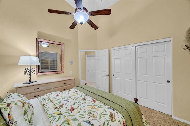 216 Chestnut Ridge Cir, Henderson, NV 89012 - carpeted bedroom with a towering ceiling, a closet, and a ceiling fan