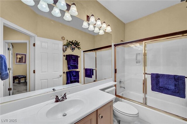 216 Chestnut Ridge Cir, Henderson, NV 89012 - bathroom with vanity and bath / shower combo with glass door