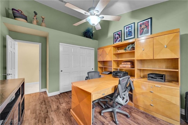 216 Chestnut Ridge Cir, Henderson, NV 89012 - office with ceiling fan, wood finished floors, and a high ceiling