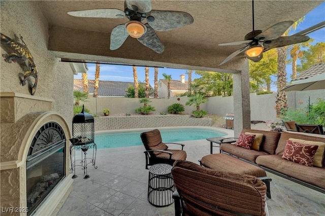 216 Chestnut Ridge Cir, Henderson, NV 89012 - view of swimming pool with ceiling fan, a fenced backyard, outdoor lounge area, and a patio area