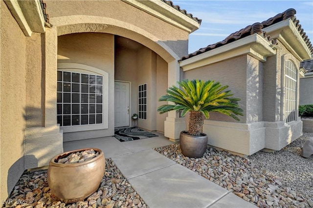 216 Chestnut Ridge Cir, Henderson, NV 89012 - entrance to property with stucco siding and a tile roof