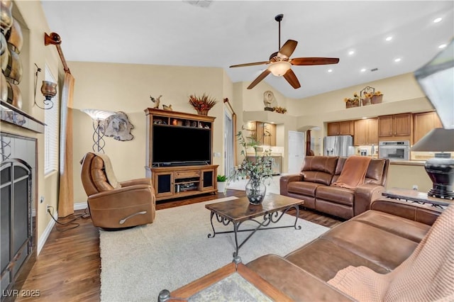 216 Chestnut Ridge Cir, Henderson, NV 89012 - living room featuring a ceiling fan, wood finished floors, recessed lighting, and vaulted ceiling