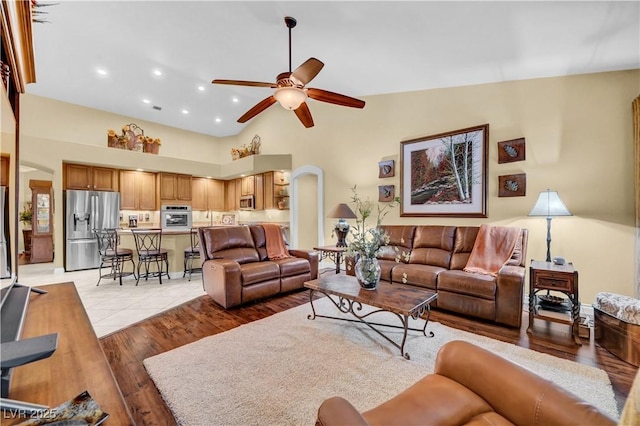 216 Chestnut Ridge Cir, Henderson, NV 89012 - living room with ceiling fan, light wood-style flooring, recessed lighting, and high vaulted ceiling