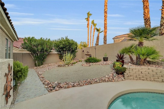 216 Chestnut Ridge Cir, Henderson, NV 89012 - fenced backyard with a patio area and an outdoor pool