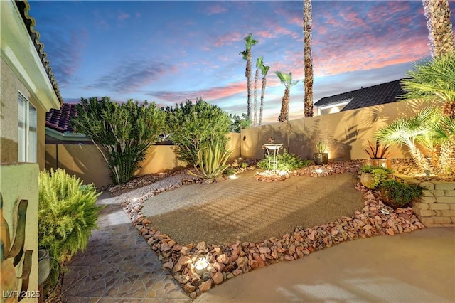 216 Chestnut Ridge Cir, Henderson, NV 89012 - fenced backyard featuring a patio