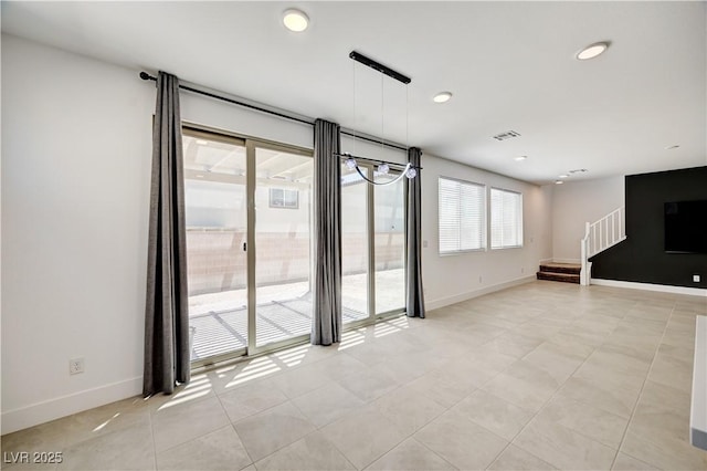 1305 Azure Jay Ave, North Las Vegas, NV 89084 - spare room with stairs, recessed lighting, and light tile patterned floors
