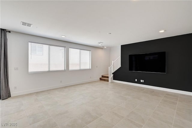 1305 Azure Jay Ave, North Las Vegas, NV 89084 - unfurnished living room featuring stairway and recessed lighting