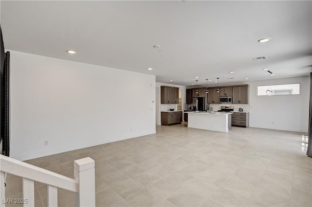 1305 Azure Jay Ave, North Las Vegas, NV 89084 - unfurnished living room featuring recessed lighting