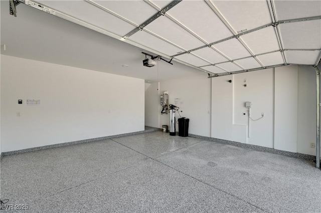 1305 Azure Jay Ave, North Las Vegas, NV 89084 - garage with a garage door opener and water heater