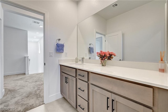 1305 Azure Jay Ave, North Las Vegas, NV 89084 - bathroom featuring double vanity, tile patterned flooring, and recessed lighting