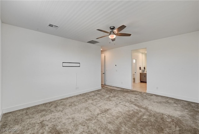1305 Azure Jay Ave, North Las Vegas, NV 89084 - spare room featuring ceiling fan and light carpet