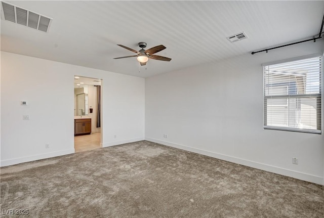 1305 Azure Jay Ave, North Las Vegas, NV 89084 - empty room with light colored carpet and a ceiling fan
