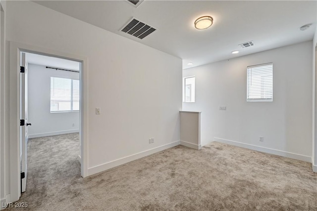 1305 Azure Jay Ave, North Las Vegas, NV 89084 - carpeted empty room featuring plenty of natural light