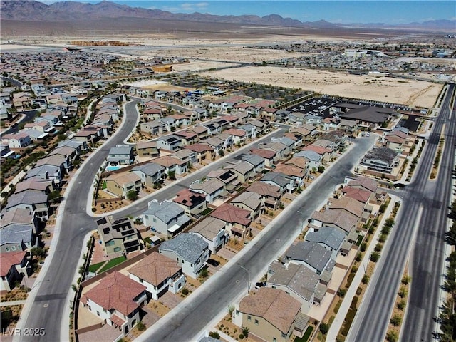 1305 Azure Jay Ave, North Las Vegas, NV 89084 - aerial view of property and surrounding area featuring nearby suburban area and a mountain backdrop