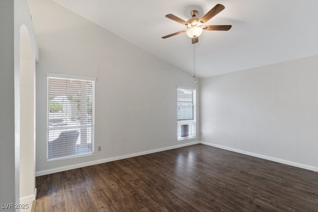 5621 Desert Creek Way, Las Vegas, NV 89149 - spare room with plenty of natural light, a ceiling fan, high vaulted ceiling, dark wood-type flooring, and arched walkways