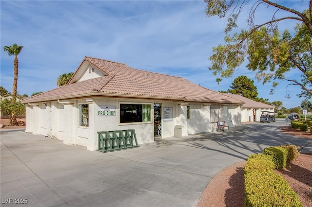 5021 Cliffrose Dr, Las Vegas, NV 89130 - view of front facade with stucco siding and a tiled roof