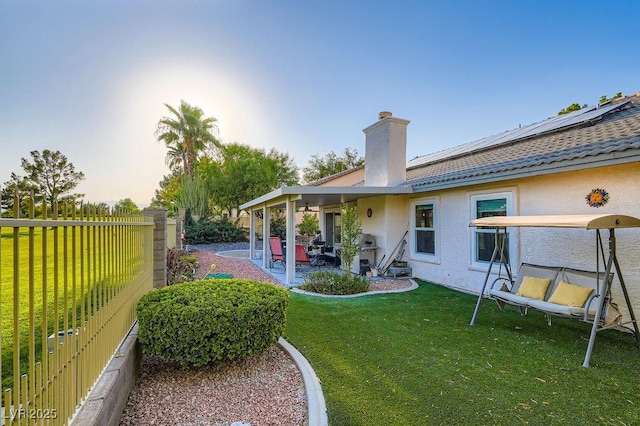 5021 Cliffrose Dr, Las Vegas, NV 89130 - fenced backyard with a patio