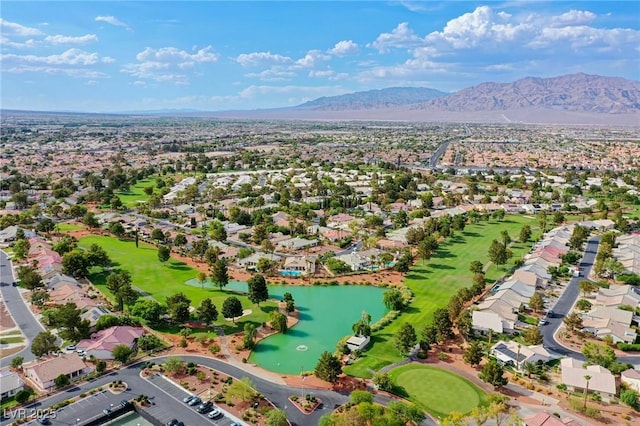 5021 Cliffrose Dr, Las Vegas, NV 89130 - aerial view of property's location with a water and mountain view, a local golf course, and nearby suburban area