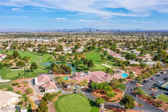 5021 Cliffrose Dr, Las Vegas, NV 89130 - aerial perspective of suburban area featuring a golf club and a water and mountain view