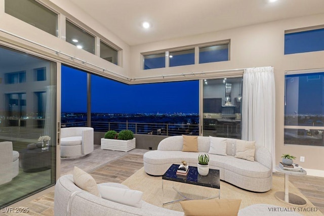 4152 Yucca Bloom St Unit 1, Las Vegas, NV 89135 - living room featuring wood finished floors and recessed lighting