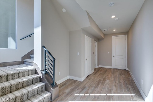 4152 Yucca Bloom St Unit 1, Las Vegas, NV 89135 - staircase with wood finished floors and recessed lighting