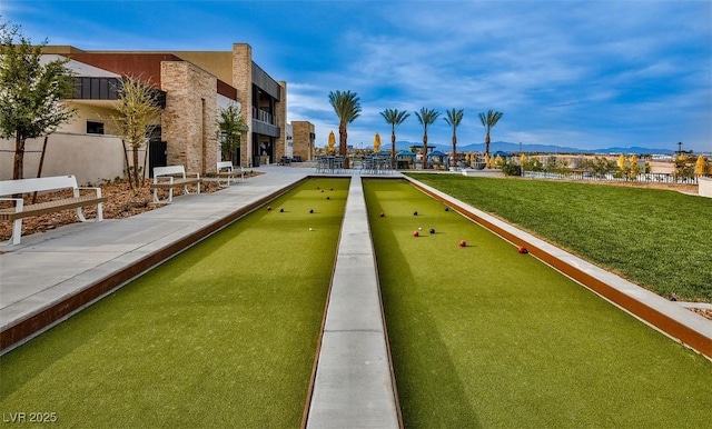 4152 Yucca Bloom St Unit 1, Las Vegas, NV 89135 - surrounding community with a game area and a mountain view