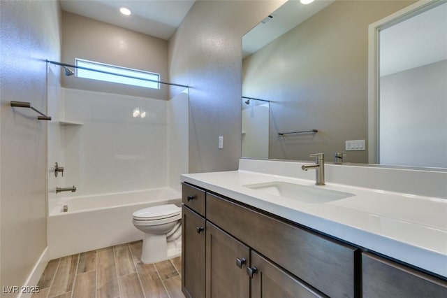 4152 Yucca Bloom St Unit 1, Las Vegas, NV 89135 - bathroom with vanity,  shower combination, wood finish floors, and recessed lighting