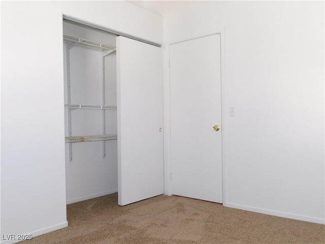 1128 Dusty Creek St, Las Vegas, NV 89128 - unfurnished bedroom featuring carpet and a closet