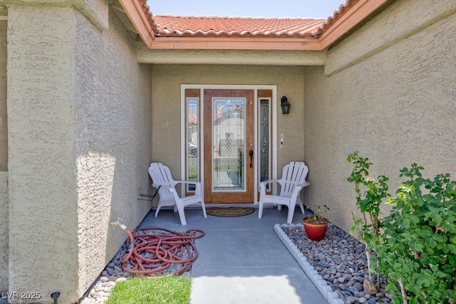 2912 Drury St, Las Vegas, NV 89108 - entrance to property featuring stucco siding and a tiled roof