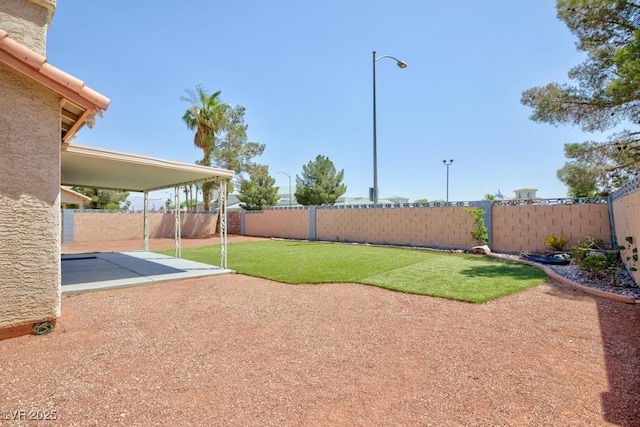 2912 Drury St, Las Vegas, NV 89108 - fenced backyard with a patio area