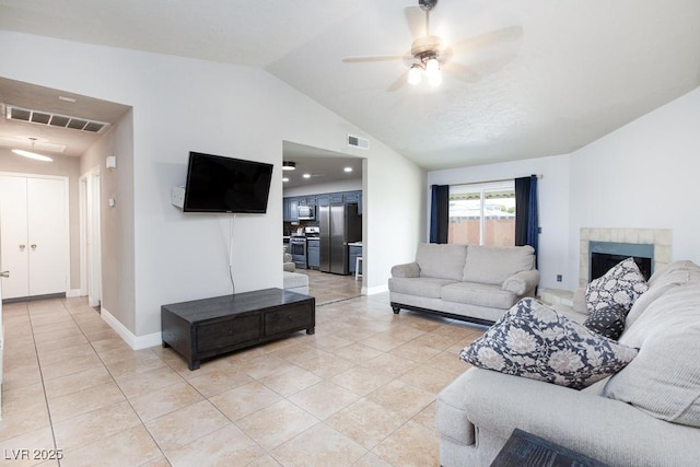 2912 Drury St, Las Vegas, NV 89108 - living room featuring a ceiling fan, light tile patterned floors, and vaulted ceiling