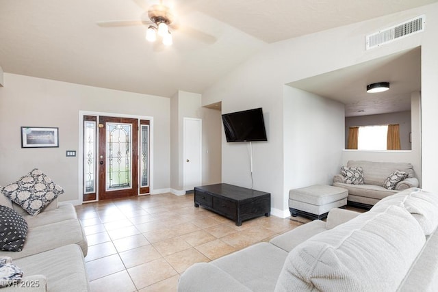 2912 Drury St, Las Vegas, NV 89108 - living area featuring light tile patterned flooring, a ceiling fan, and vaulted ceiling