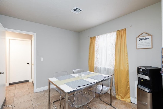 2912 Drury St, Las Vegas, NV 89108 - dining space with light tile patterned flooring and baseboards