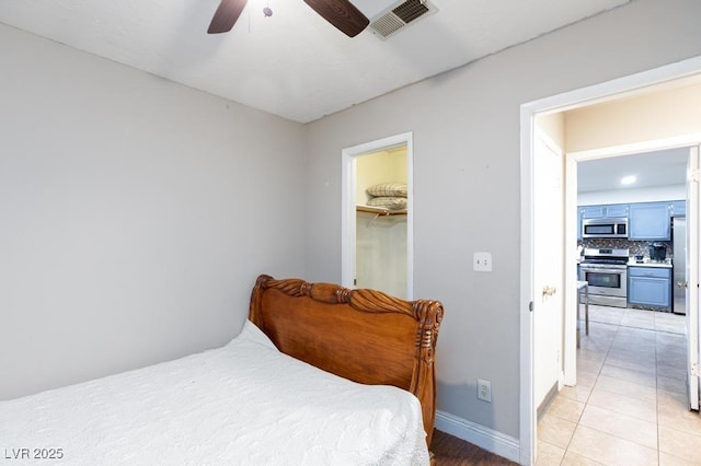 2912 Drury St, Las Vegas, NV 89108 - bedroom with a ceiling fan and a spacious closet