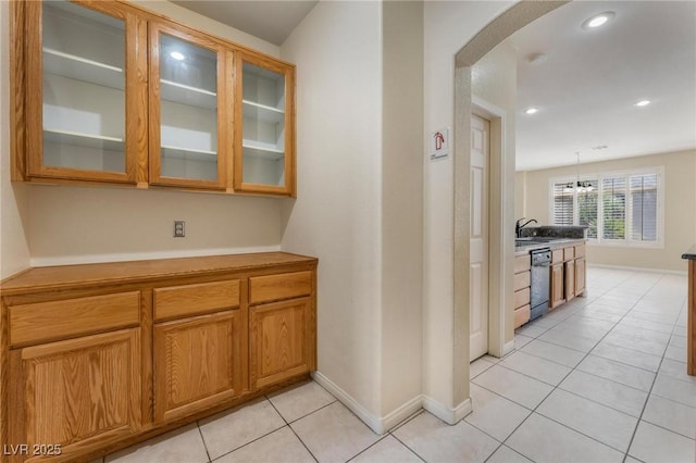 8901 Goldstone Ave, Las Vegas, NV 89143 - bar featuring arched walkways, dishwasher, light tile patterned floors, recessed lighting, and hanging light fixtures
