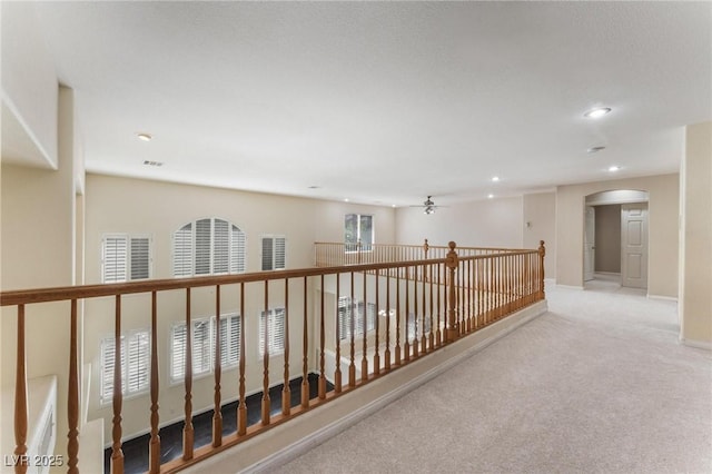 8901 Goldstone Ave, Las Vegas, NV 89143 - corridor featuring carpet flooring, arched walkways, and recessed lighting